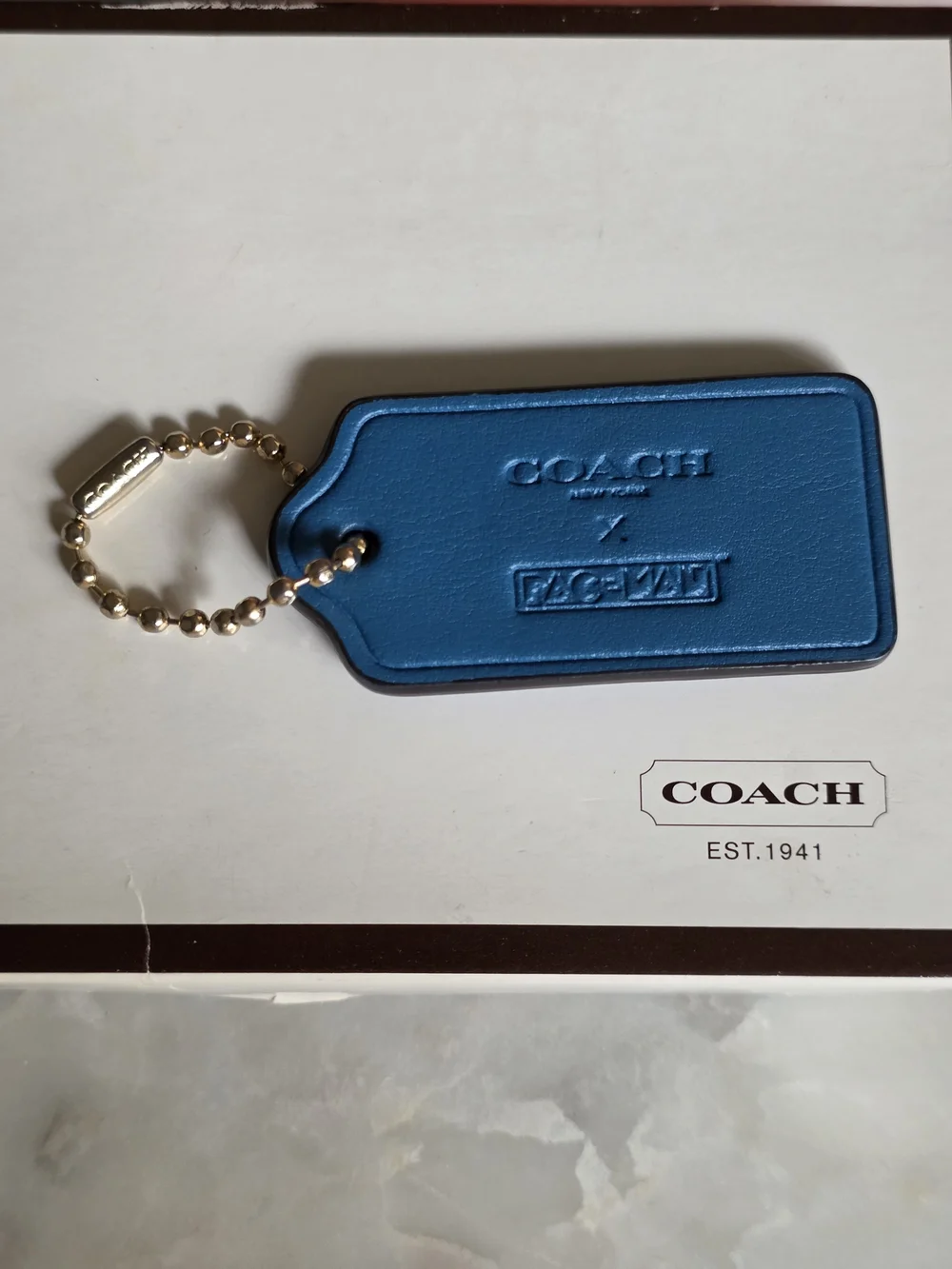 COACH X Pacman Blue Leather Hangtag W/ Gold-tone Ball chain